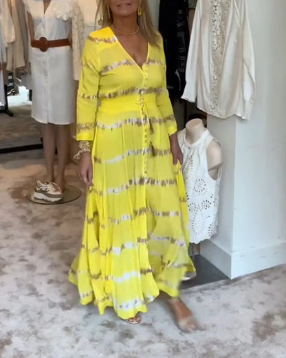 Maxi jurk met V-hals en knopen