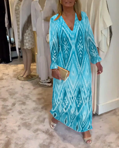 Maxi jurk met diepe V-hals en ruffles