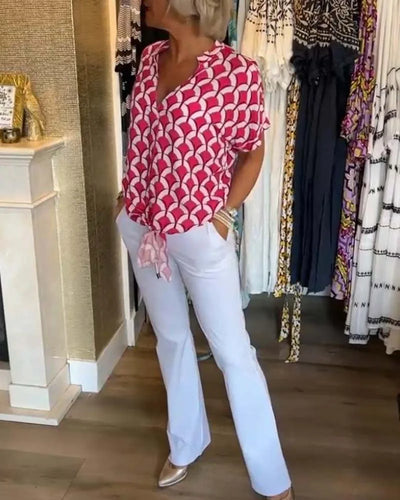 Blouse met V-hals en knoopdetail