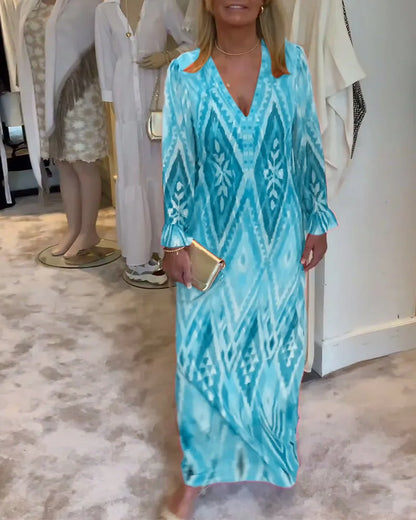 Maxi jurk met diepe V-hals en ruffles